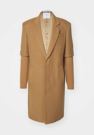 Camel wool-blend coat with tailored lapels, shoulder-length sleeves, ribbed knit accents, two front pockets, and a smooth satin lining.