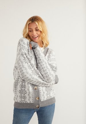 Cardigan grigio e bianco con motivo, maniche oversize, orlo a costine e bottoni. Presenta un design Fair Isle con texture lavorata a maglia evidente.