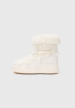 Moon Boot bianco foderato in pelliccia con un'esterno liscio, forma arrotondata, suola spessa e fondo in gomma tan a contrasto. Presenta lacci e marchio.