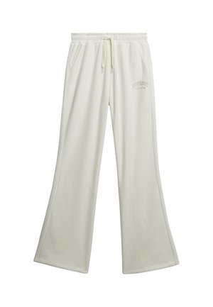 Pantaloni da tuta color crema in una vestibilità rilassata, realizzati in materiale morbido. Caratterizzati da una vita elasticizzata, cordoncino e ricamo del logo.