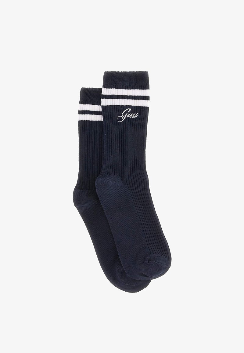 Calze a coste blu navy con strisce bianche in alto e logo ricamato. Presentano una lunghezza classica per il polpaccio e una texture liscia.