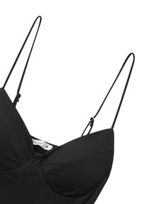 Costume da bagno nero con sottili spalline regolabili, coppe imbottite e una texture di tessuto liscia. Presenta un design del corpetto leggermente strutturato.