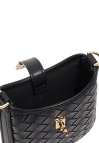 Black leather handbag featuring a woven texture, gold hardware, and a secure clasp. Open interior with a smooth lining.