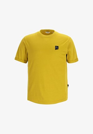 Dzeltena īsa piedurkne T-krekls, izgatavots no kokvilnas. Iebūvēta melna logo uzlīme uz krūtīm un sarullētas piedurknes. Gluda tekstūra ar apaļu kakla izgriezumu.