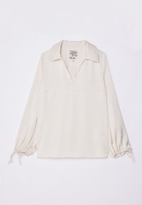 Blusa a maniche lunghe color crema con scollo a V e design con colletto. Presenta polsini elastici e un tessuto morbido, leggermente strutturato.