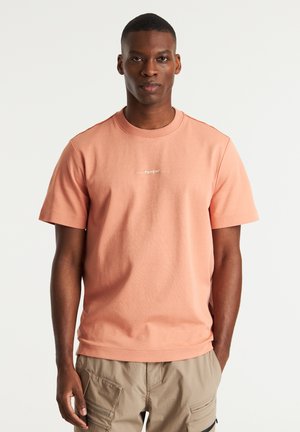 SWIRL - T-shirt con stampa - orange