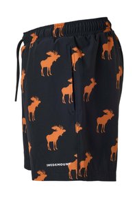 Shorts noirs avec taille élastique, cordon de serrage, poche latérale et motifs d'élans orange imprimés partout. Logo "Swedemount" près de l'ourlet.