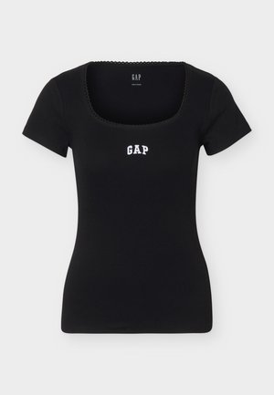 Μαύρο εφαρμοστό τοπ με κοντό μανίκι και τετράγωνη λαιμόκοψη, με το λογότυπο "GAP" σε λευκά γράμματα στο κέντρο του στήθους.