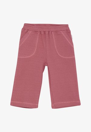 Różowe, prążkowane spodnie dla małych dzieci z elastycznym pasem i dwoma przednimi kieszeniami, ułożone na płasko.