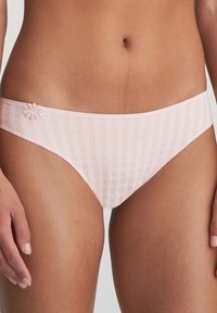 Light pink striped bikini briefs with delicate floral accent at the hip and soft, sheer texture. Classic, low-rise cut.