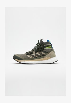 FREE HIKER BOOST PRIMEKNIT SHOES - Hiking shoes - legend green/core black/sigal green