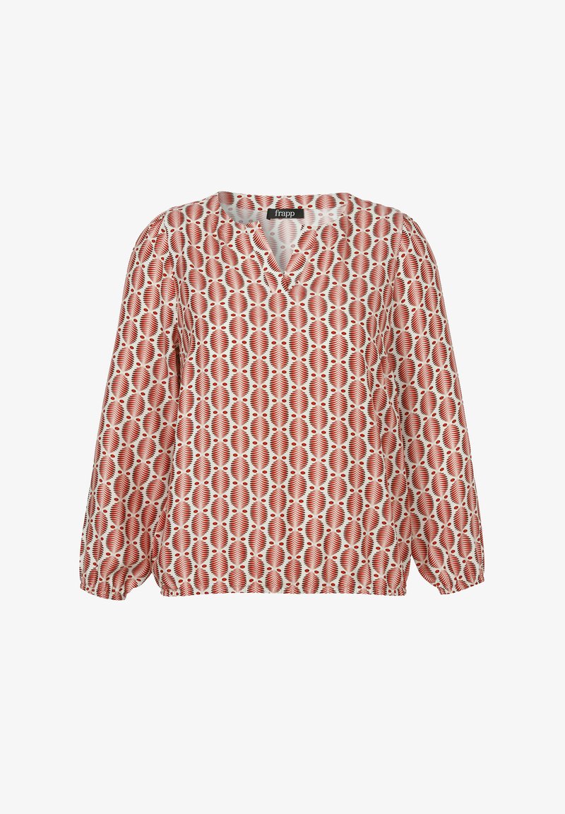 Blouse à motifs rouge et crème avec un col en V, des manches longues et des poignets élastiques. Présente des motifs géométriques en forme de feuilles et un léger éclat.