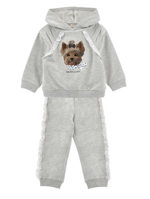 Gråt todlersæt med hættetrøje og bukser, dekoreret med hvid blonderkant og en palietbelagt hundefigur med sløjfe og tørklæde på hættetrøjens front.