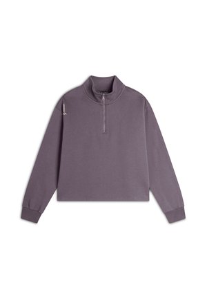 Sweatshirt cropped violet avec un col haut et une fermeture éclair quart. Texture douce, manches longues et un logo sur l'épaule gauche.