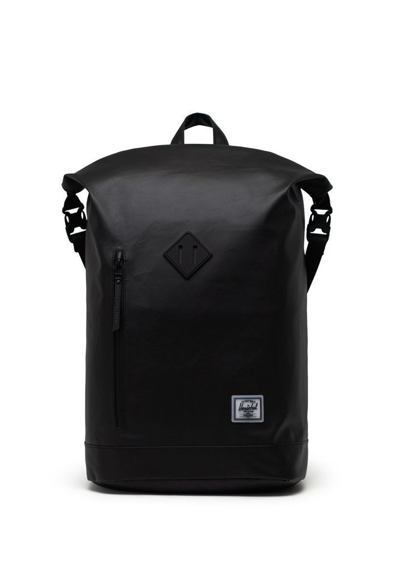 Mustakimmin rullausreppu, joka on valmistettu kestävästä materiaalista. Varustettu etupussilla, säädettävillä hihnoilla ja timantinmuotoisella logolla edessä.