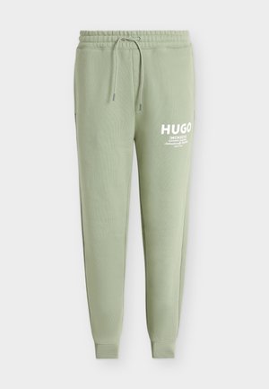 HUGO, NEVEZ - Tracksuit bottoms - beige