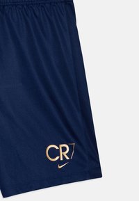 Nike Performance CR7 DF UNISEX - Pantaloncini sportivi - blue void/metallic gold