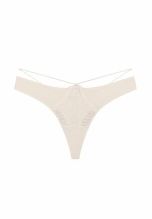 Koronkowy string w jasnym kremie z cienkimi ramiączkami, z geometrycznym wzorem i teksturowanym designem na środku. Minimalistyczne cięcie i styl.