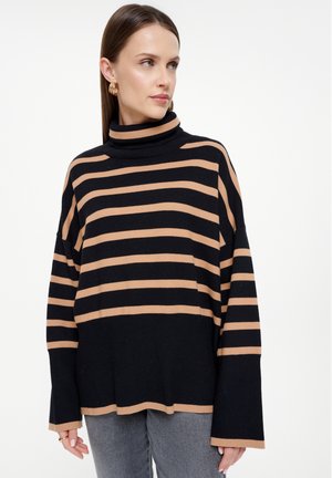 Zwart en beige gestreepte coltrui met een losse pasvorm, voorzien van lange mouwen en een gestructureerd breipatroon.