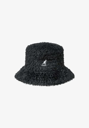 Black bucket hat made of soft, textured fabric with a fuzzy finish. Features a white embroidered Kangol logo on the front.