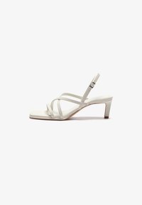 Επιλέχθηκε, off white
