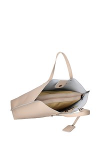 Beige leren tote bag met een grijze binnenkant, voorzien van een ritscompartiment, een vlakke zak en lange handvatten om te dragen.