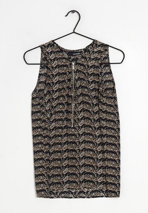 Sleeveless top with a black and cream wave pattern, featuring a front zipper closure and a lightweight, textured fabric.