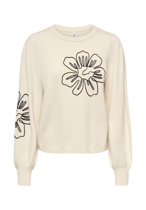 Pull crème à manches longues, avec broderie florale noire sur le devant et la manche. Texture douce et ourlet côtelé.