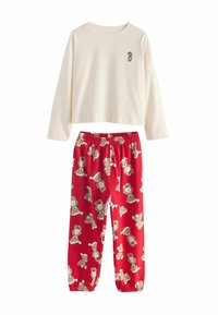 Maglietta a maniche lunghe color crema con design di un orso; pantaloni rossi con motivo di orsi in cappelli di Natale; vita elasticizzata; vestibilità casual.