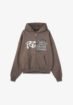 Braune Kapuzenjacke mit Reißverschluss und großem vorderem Aufdruck. Mit verstellbarer Kapuze, zwei Fronttaschen sowie Rippbündchen an Ärmeln und Saum. Einzigartiges Logodesign.