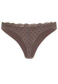 Bruine string met kant en een stippenpatroon. Zachte stof, middelhoge pasvorm en een gladde textuur met contrasterende zwarte stippen.