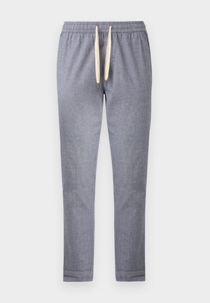 Lysegrå slanke bukser med elastisk midjebånd og hvit snor, vist mot en ensfarget bakgrunn.