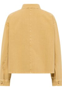 Giacca di jeans gialla, design cropped, maniche lunghe, colletto dritto, vista posteriore che mostra una superficie pulita, testurizzata e dettagli di cucitura minimi.