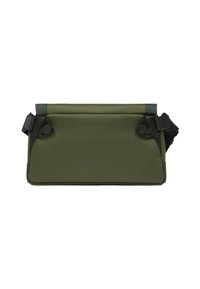 Sac bandoulière en tissu vert avec une surface texturée, doté de sangles ajustables et d'accents de ferrures circulaires sur les côtés.