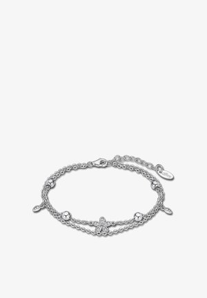 Silver bracelet featuring chain links, small round beads, and a flower design at the center. Includes a clasp and adjustable chain detail.