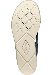 Sole della sandalo GEOX con una base in gomma beige chiaro, caratterizzata da un motivo a diamante e fori di ventilazione per la traspirabilità.