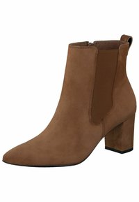Bruine suede enkellaarzen met een spitse neus, elastische zijpanelen en een blokhak. Eenvoudig ontwerp met een gladde textuur.