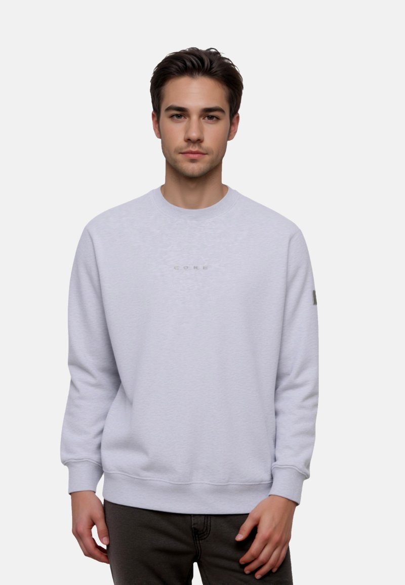 Light gray crewneck sweatshirt made of soft fabric, featuring ribbed cuffs and hem, and a subtle "CORE" logo on the chest.