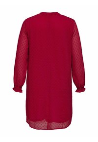 Czerwona, długa sukienka z długimi rękawami, o teksturowanym, kropkowanym wzorze. Prosty, okrągły dekolt i marszczone mankiety, wykonana z lekkiego, półprzezroczystego materiału.