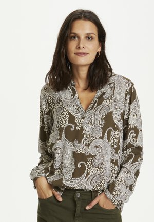 Gemustertes Hemd in Olivgrün mit weißen Paisley- und Blumendesigns. Lange Ärmel mit Knopfmanschetten und V-Ausschnitt.