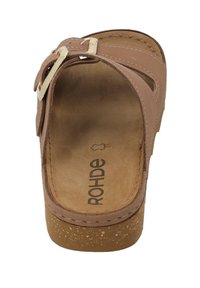 Rohde clogs with a light brown synthetic upper, featuring a wide strap and gold-tone buckle. Cork footbed and textured outsole.