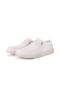 White canvas shoes with a rounded toe, flexible rubber sole, decorative cord lacing, and wooden bead accents on the sides.