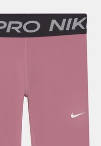 Nike Performance UNISEX - Leggings - Calças - pink