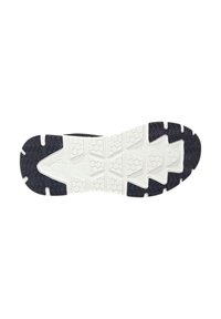 Suola di scarpa con parte superiore in gomma nera e battistrada bianco con motivi decorativi, caratterizzata da design esagonali e triangolari per trazione e durata.