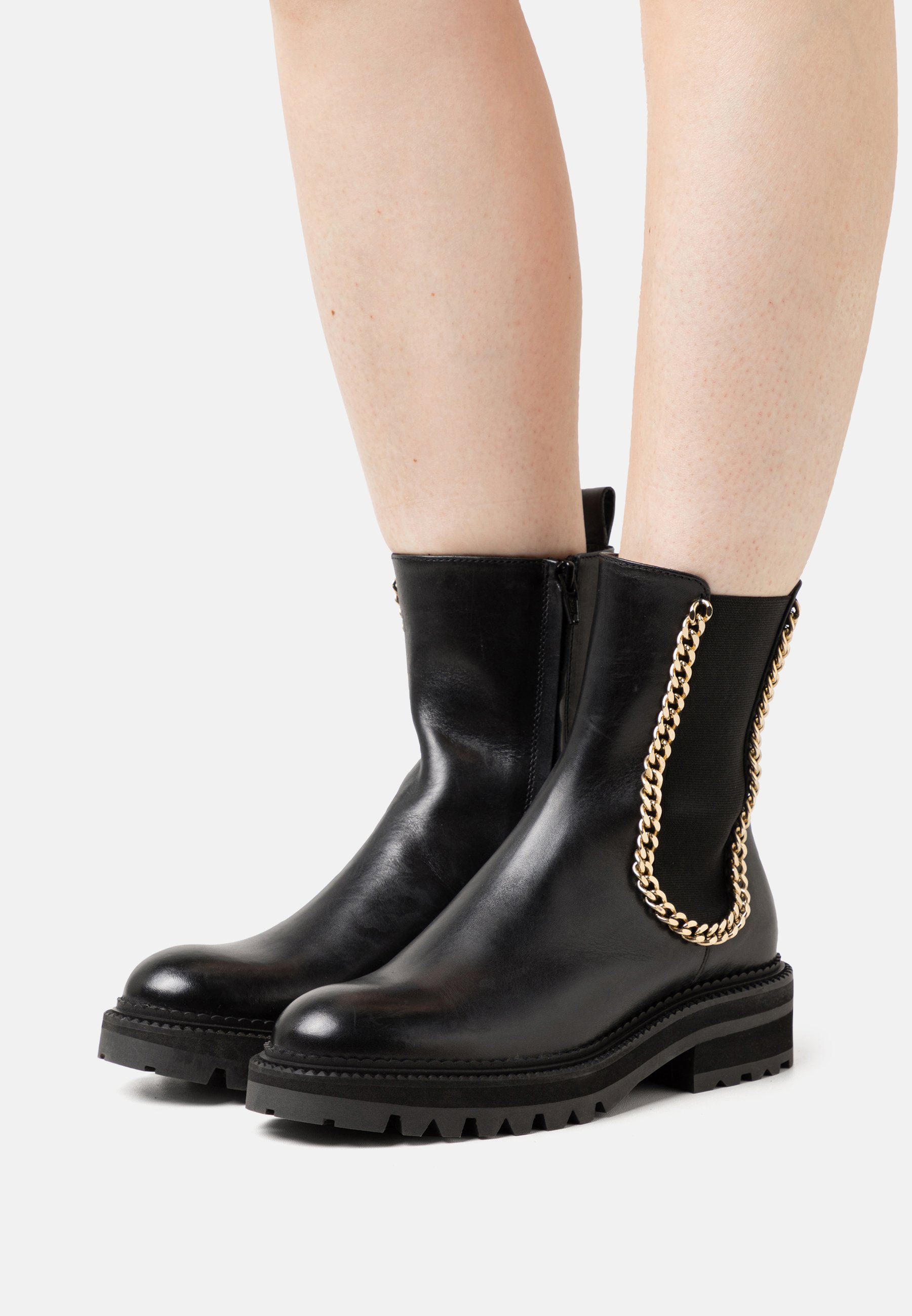 black and gold ankle boots uk