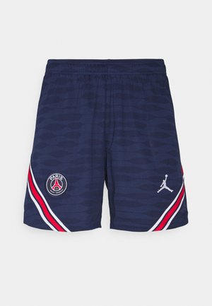 Shorts de sport bleu marine du Paris Saint-Germain avec des bandes diagonales rouges et blanches, avec les logos PSG et Jumpman sur les côtés avant.