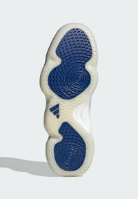 Podeszwa buta w niebiesko-białym wzorze, z teksturowanymi wzorami i spiralnymi detalami. Logo Adidas jest widoczne z boku.
