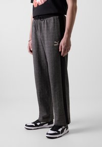 Puma RELAXED TRACK PANTS - Trainingsbroek - black/alpine snow