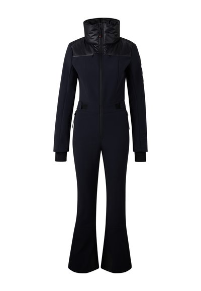 Černý lyžařský oblek s vysokým límcem, přiléhavým střihem, předním zipem a rozšířenými nohavicemi. Vyrobený z hladké, elastické tkaniny.