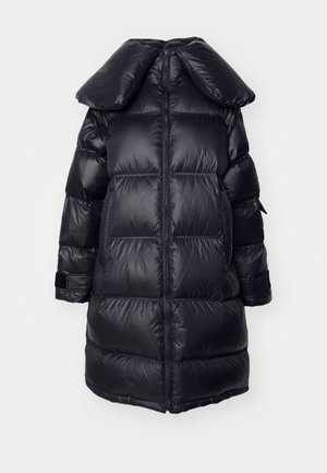 Black puffer coat with a large collar, featuring quilted sections, a central zipper, and elastic cuffs. Smooth, shiny fabric texture.